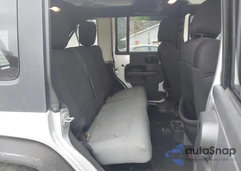 2009 Jeep Wrangler Unlimited Sahara z USA, uszkodzony, nr VIN 1J4GA59119L764823